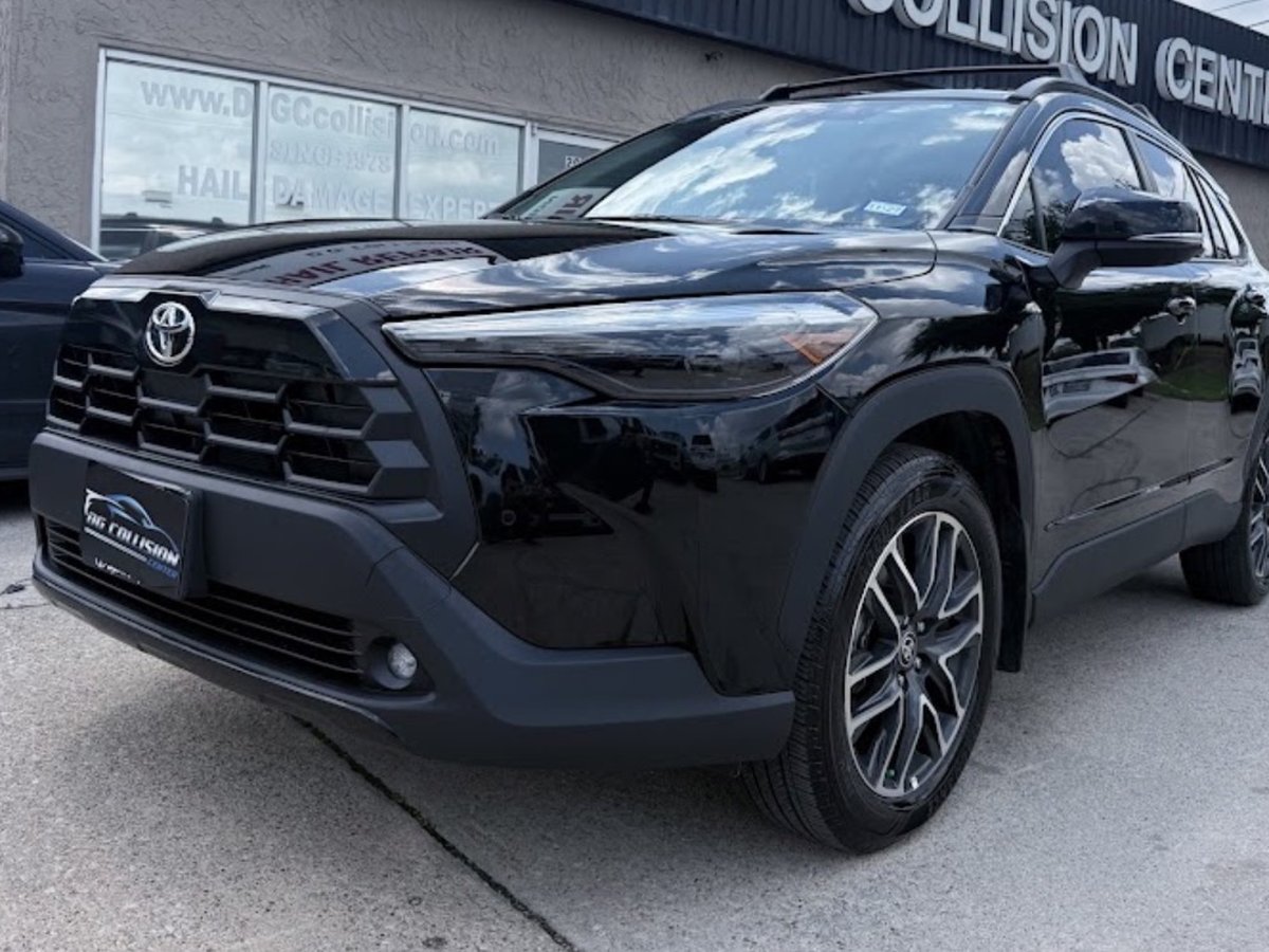 Front-end collision repair completed at DG Collision Center Lewisville TX — Toyota RAV4 bumper, grille, and hood restored to factory finish