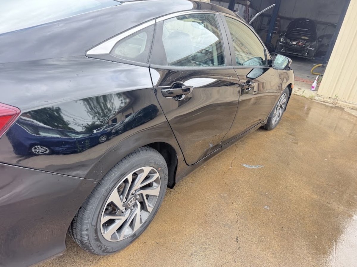Side-impact collision repair completed at DG Collision Center Lewisville TX — Honda Civic doors and quarter panel repaired and color-matched